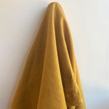 Cinnamon Linen — mid-weight plain-weave linen with a slightly crisp handle that softens with wear, 100% linen, 135cm wide