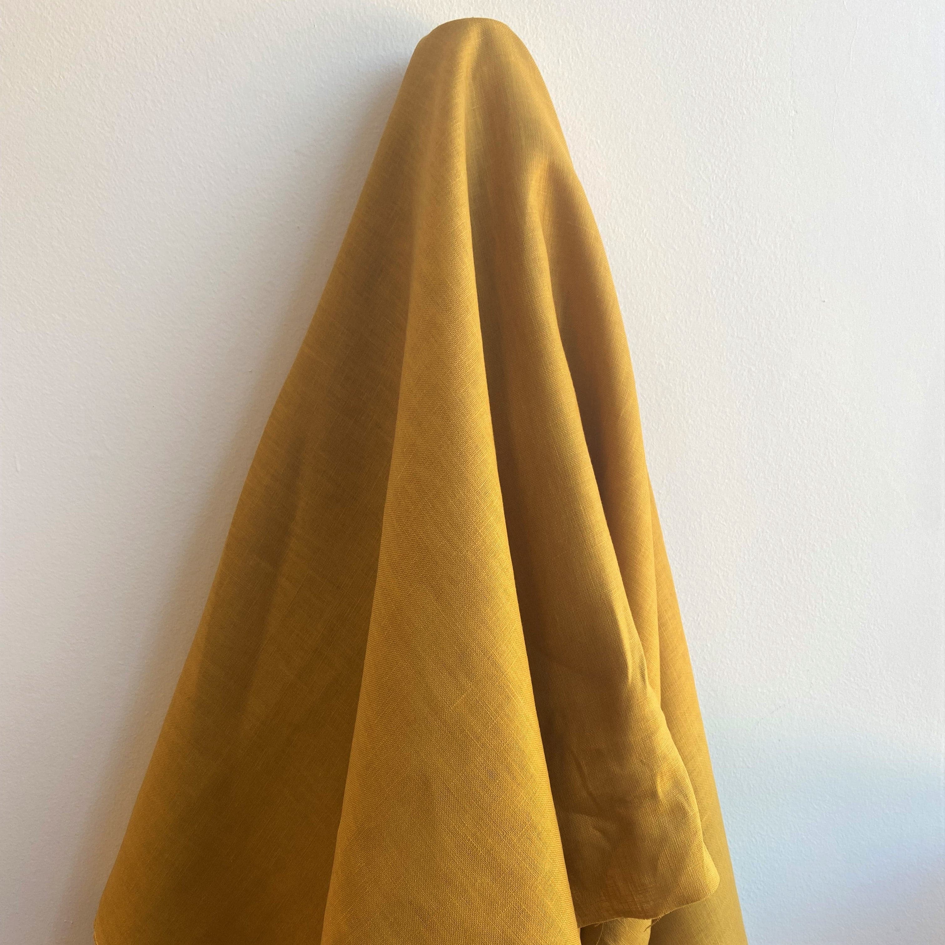 Cinnamon Linen — mid-weight plain-weave linen with a slightly crisp handle that softens with wear, 100% linen, 135cm wide