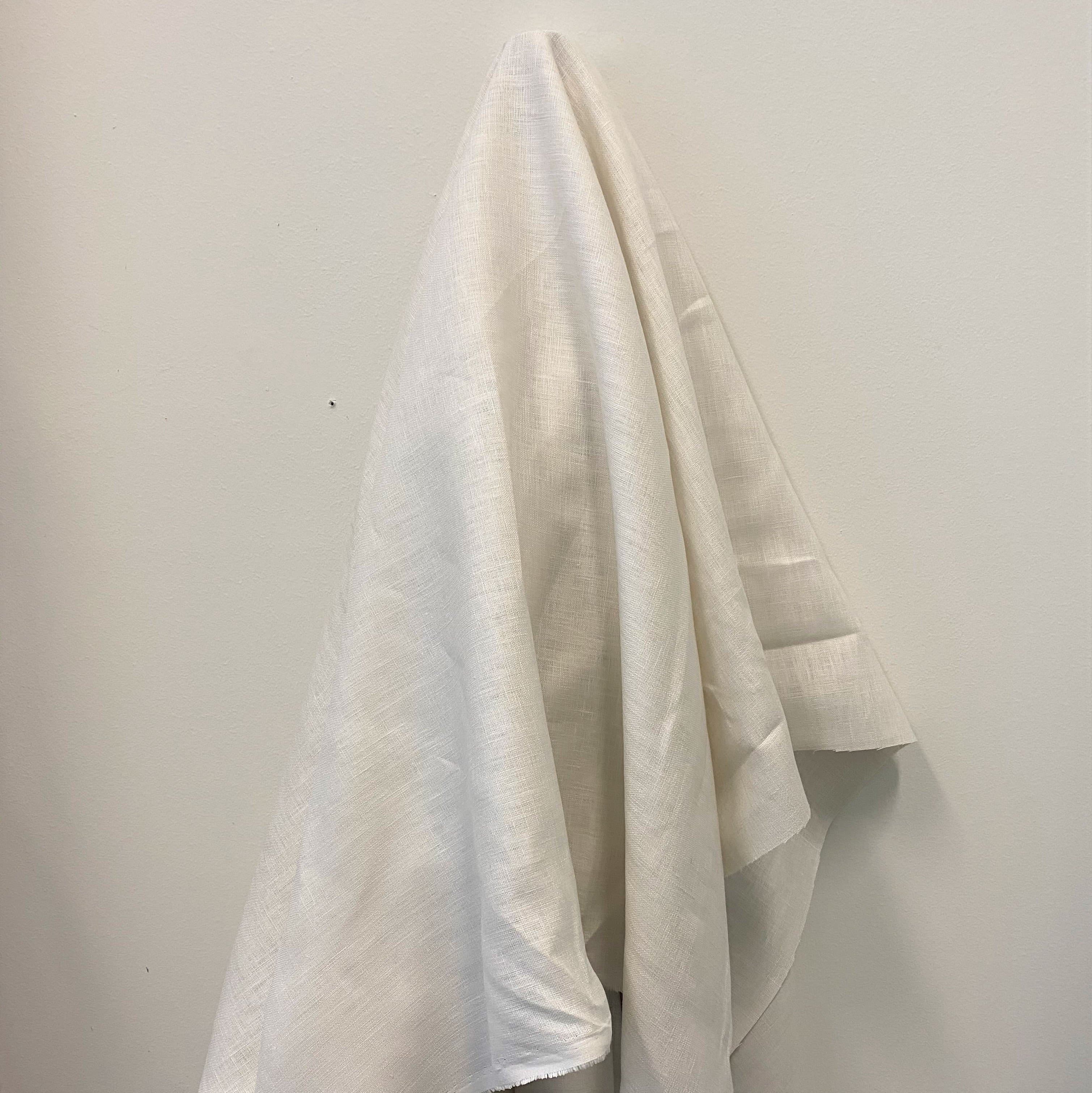 Cream Linen — mid-weight plain-weave linen with a slightly crisp handle that softens with wear, 100% linen, 135cm wide