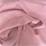 Dusty Pink Linen — mid-weight plain-weave linen with a slightly crisp handle that softens with wear, 100% linen, 135cm wide