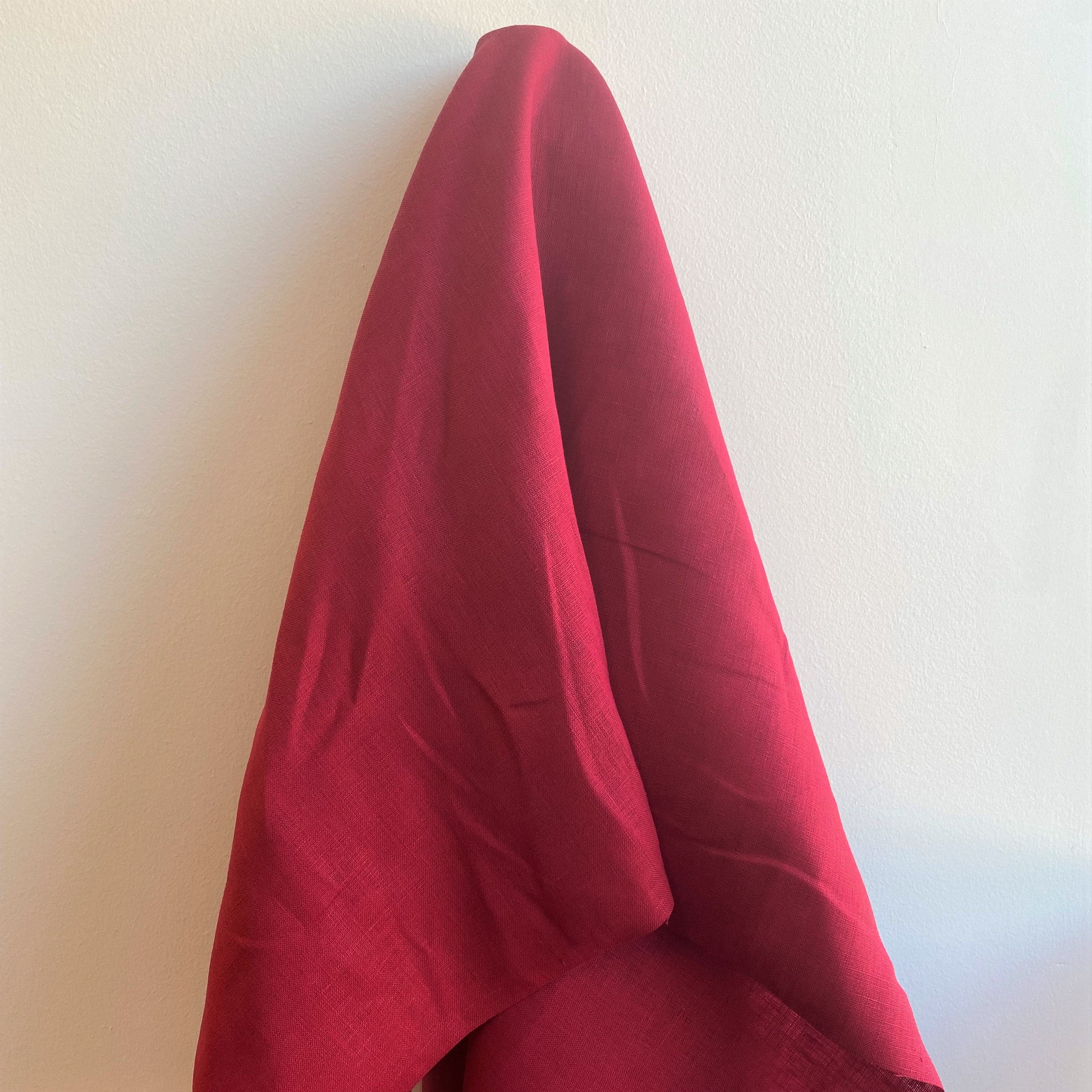 Rust Linen — mid-weight plain-weave linen with a slightly crisp handle that softens with wear, 100% linen, 135cm wide