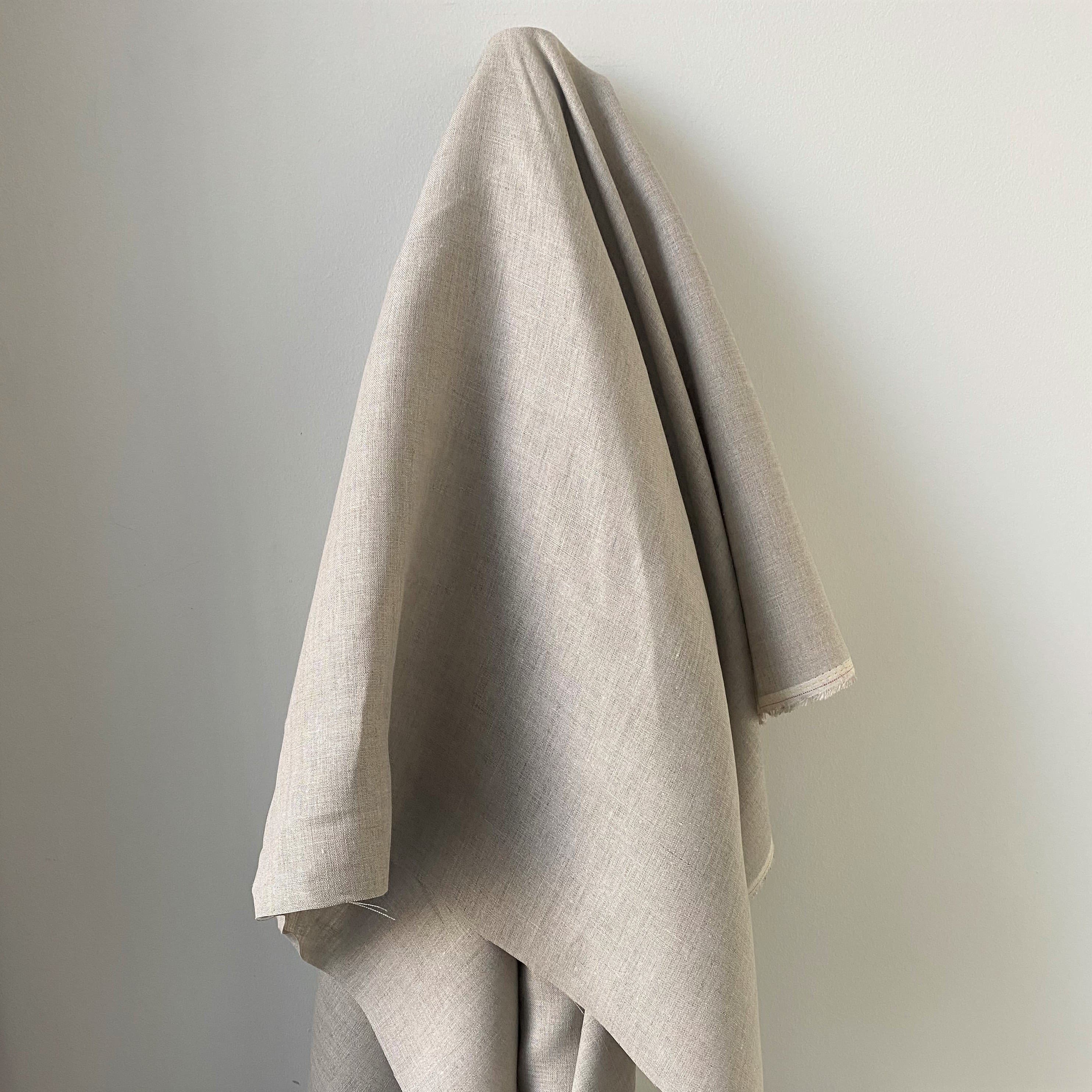 Sand Linen — mid-weight plain-weave linen with a slightly crisp handle that softens with wear, 100% linen, 135cm wide