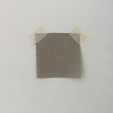 Sand Linen — mid-weight plain-weave linen with a slightly crisp handle that softens with wear, 100% linen, 135cm wide