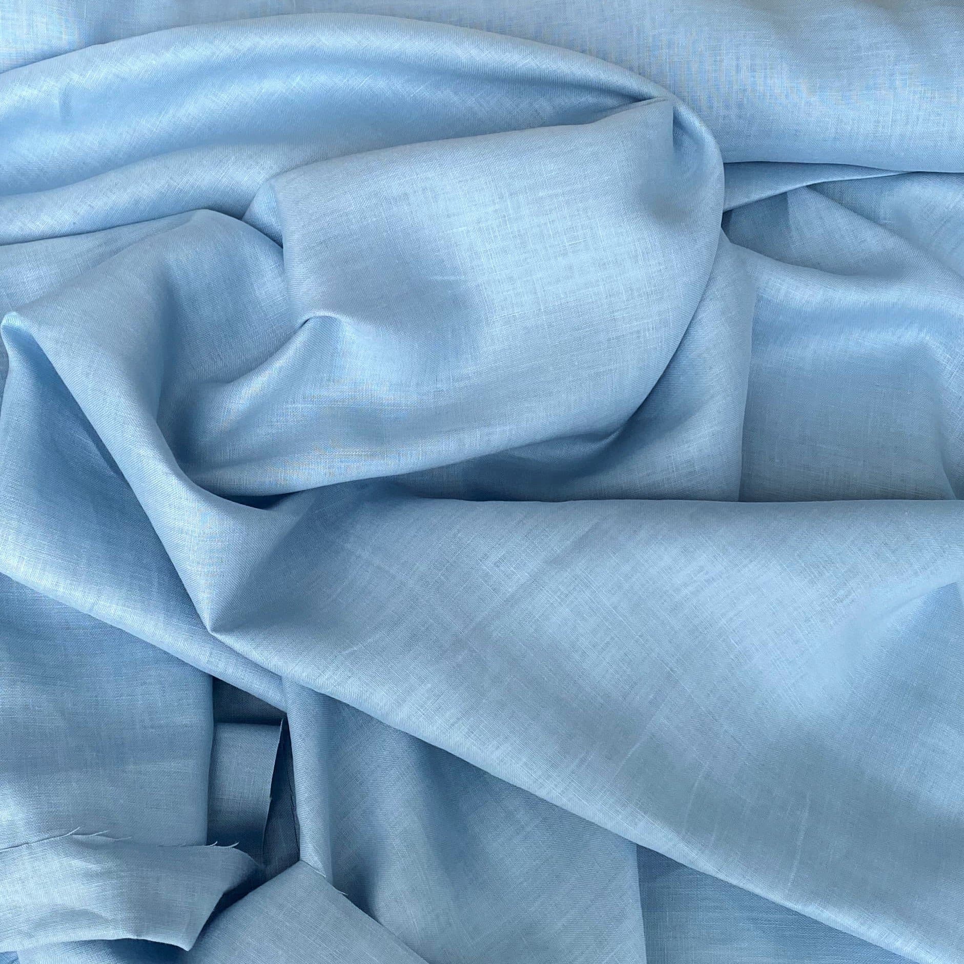 Sky Blue Linen — mid-weight plain-weave linen with a slightly crisp handle that softens with wear, 100% linen, 135cm wide