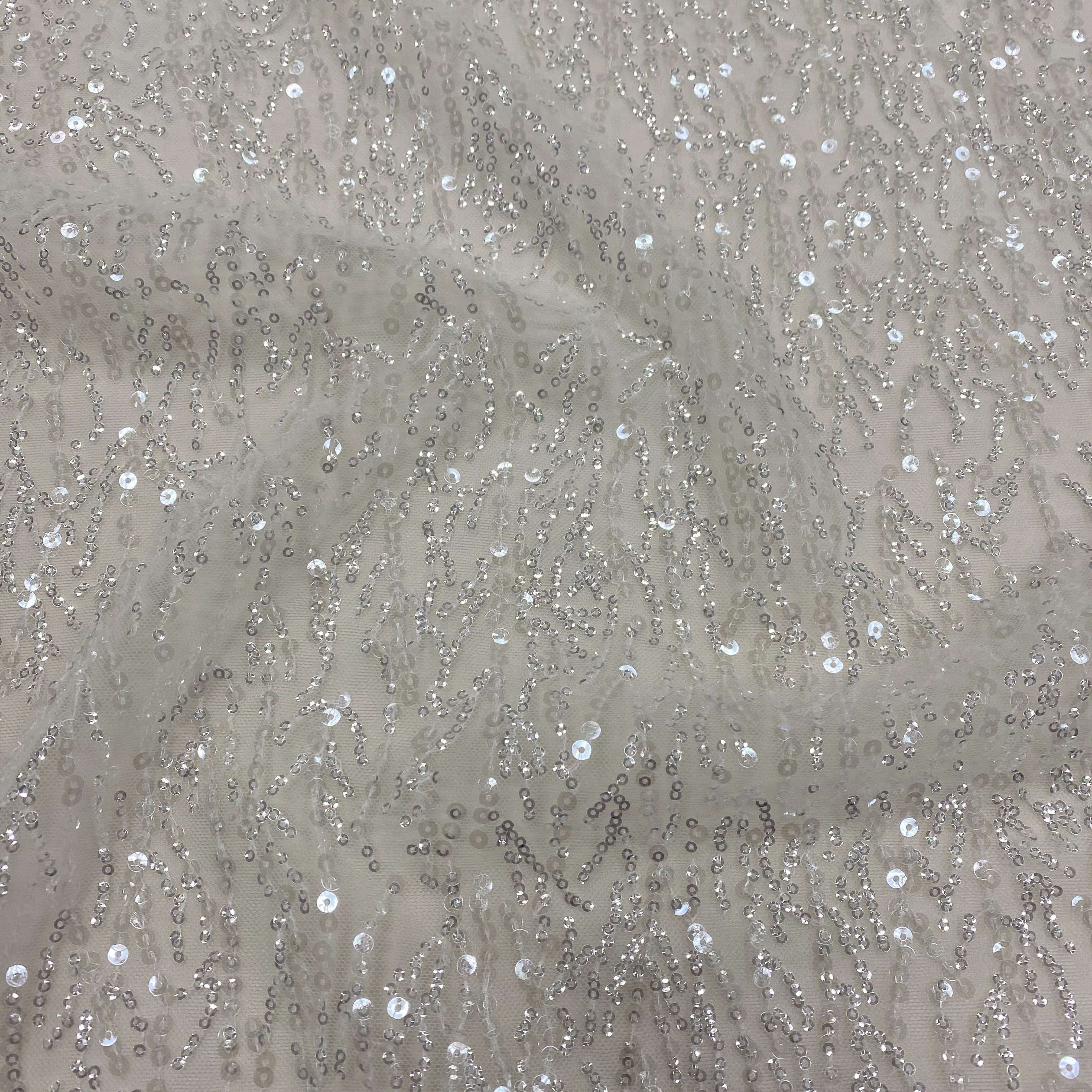 Ivory Sequined Tulle — featuring sequins, 60% rayon 40% nylon, 130cm wide