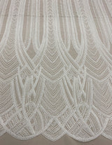 Ivory Heavily Embellished Tulle — featuring scalloped edges and hand-beading, 50% nylon 50% rayon, 130cm wide