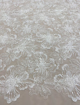 Ivory Embroidered Corded Tulle — featuring floral motifs, a corded texture and hand-beading, 50% nylon 50% rayon, 130cm wide