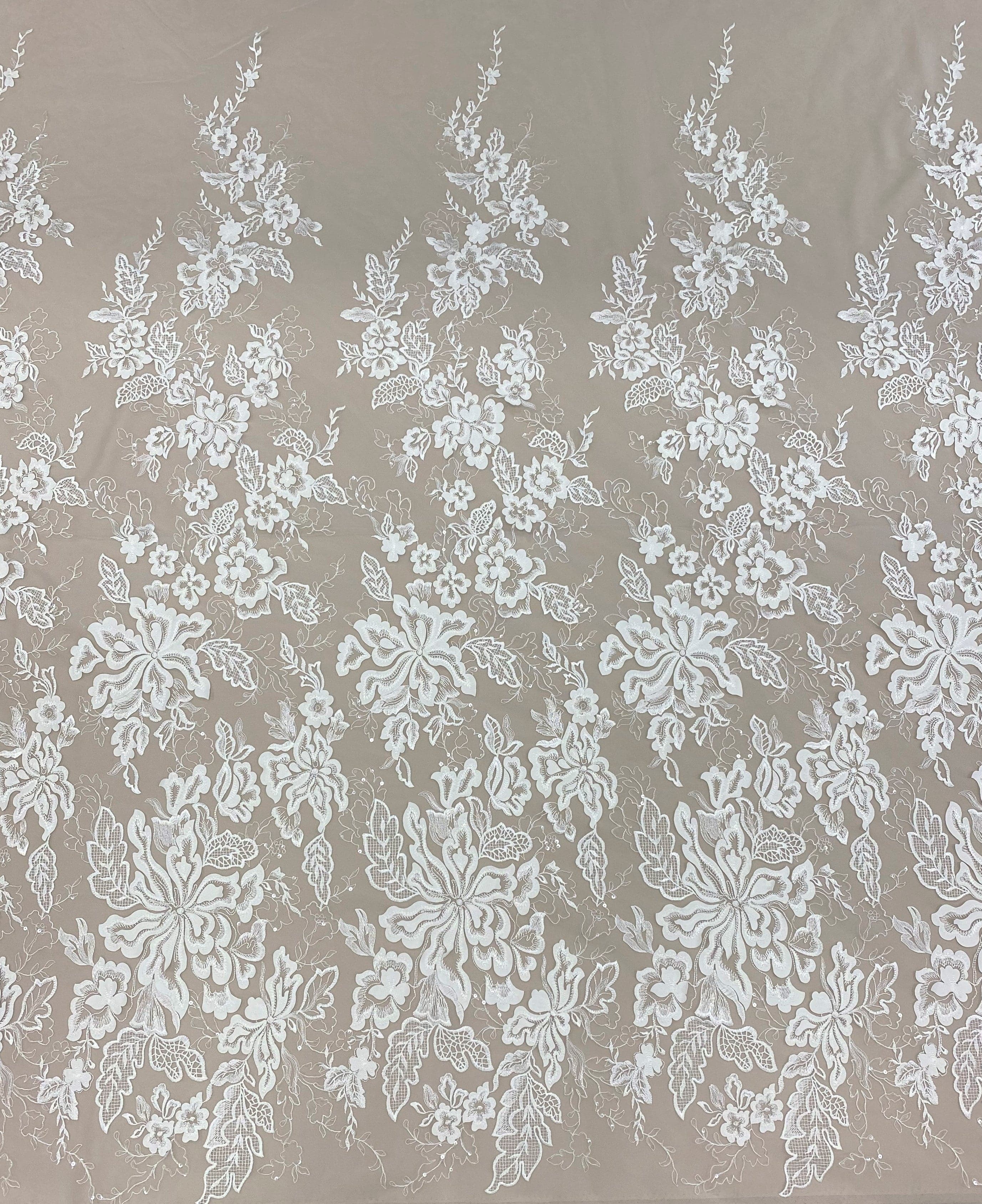 Ivory Embellished Tulle — featuring floral motifs, a border design and sequins, 30% nylon 60% rayon 10% polyester, 130cm wide