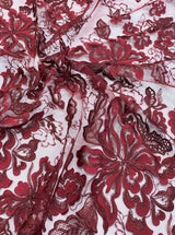 Wine Embellished Tulle — featuring floral motifs, a border design and sequins, 30% nylon 60% rayon 10% polyester, 130cm wide