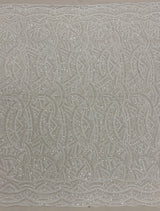 Ivory Embellished Tulle — featuring scalloped edges, hand-beading and sequins, 50% rayon 50% nylon, 130cm wide