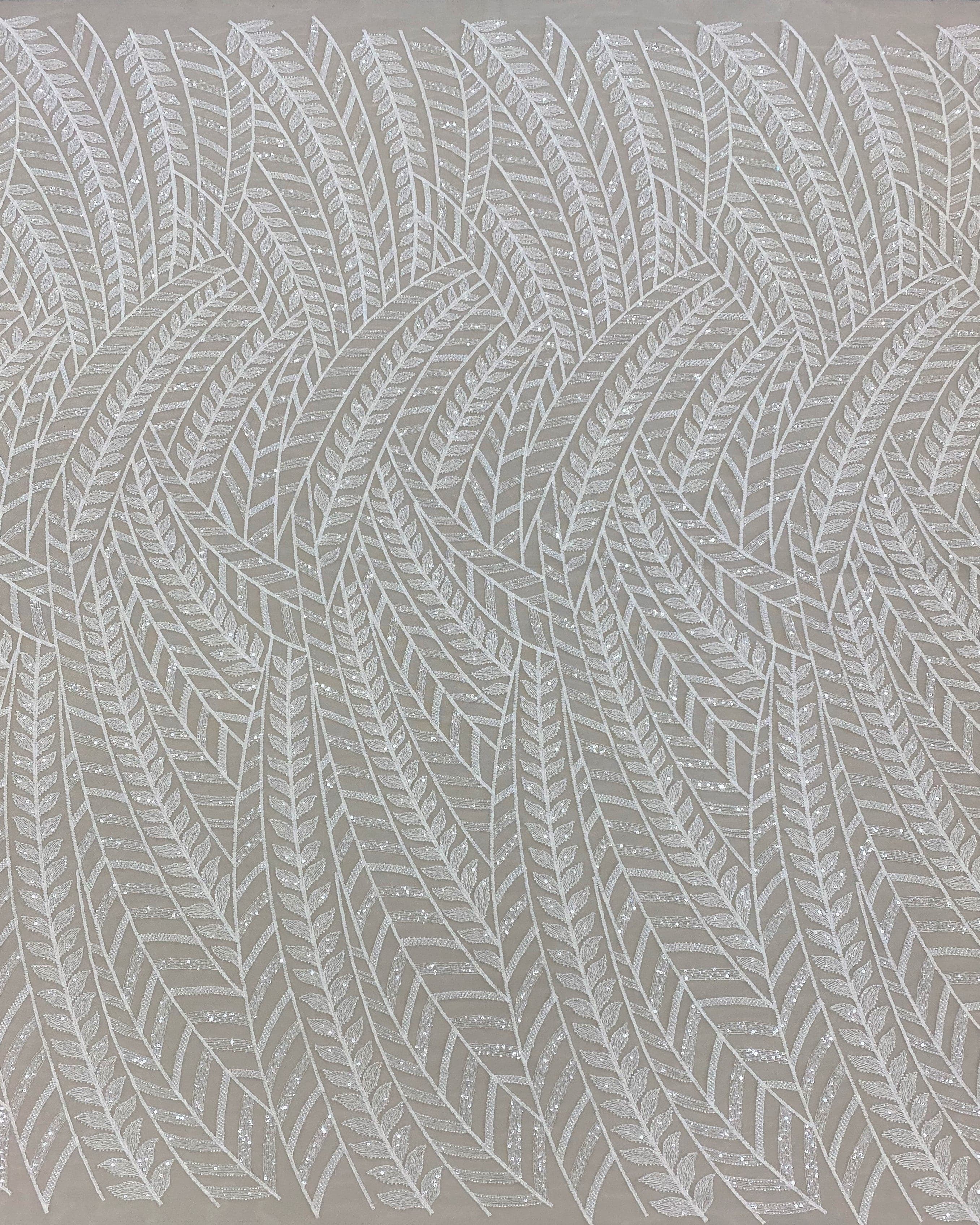 Ivory Embroidered Tulle — soft, 50% nylon 50% rayon, 130cm wide