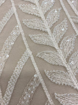 Ivory Embroidered Tulle — soft, 50% nylon 50% rayon, 130cm wide