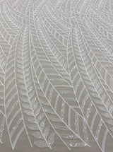 Ivory Embroidered Tulle — soft, 50% nylon 50% rayon, 130cm wide