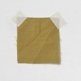 Mustard Linen — mid-weight plain-weave linen with a slightly crisp handle that softens with wear, 100% linen, 135cm wide