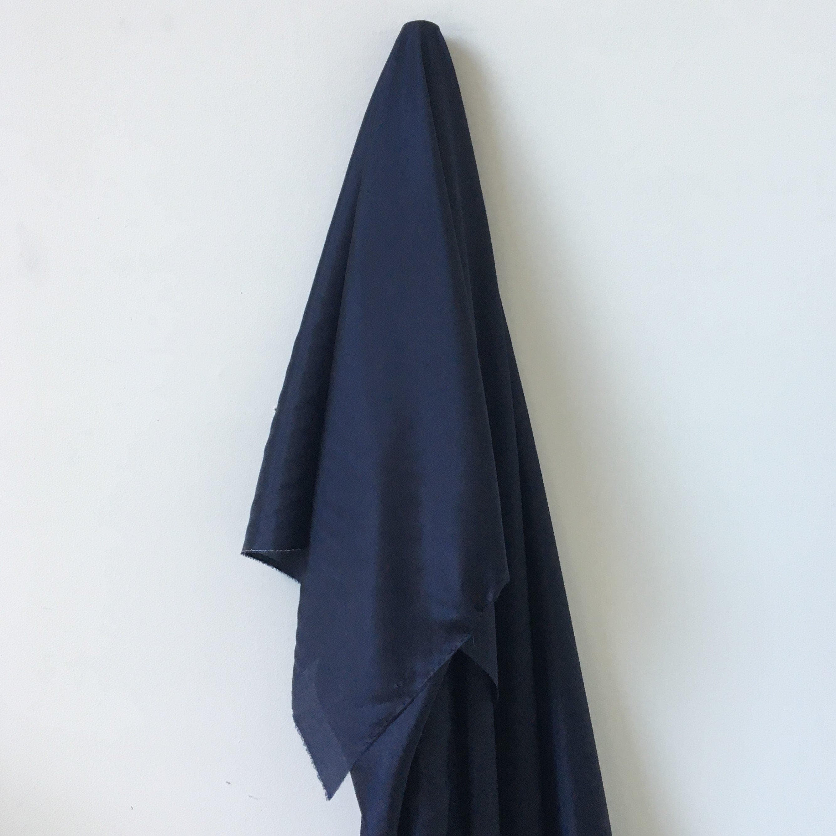 Navy Habotai — soft with a light, airy drape and a smooth satin finish, 100% mulberry silk, 140cm wide