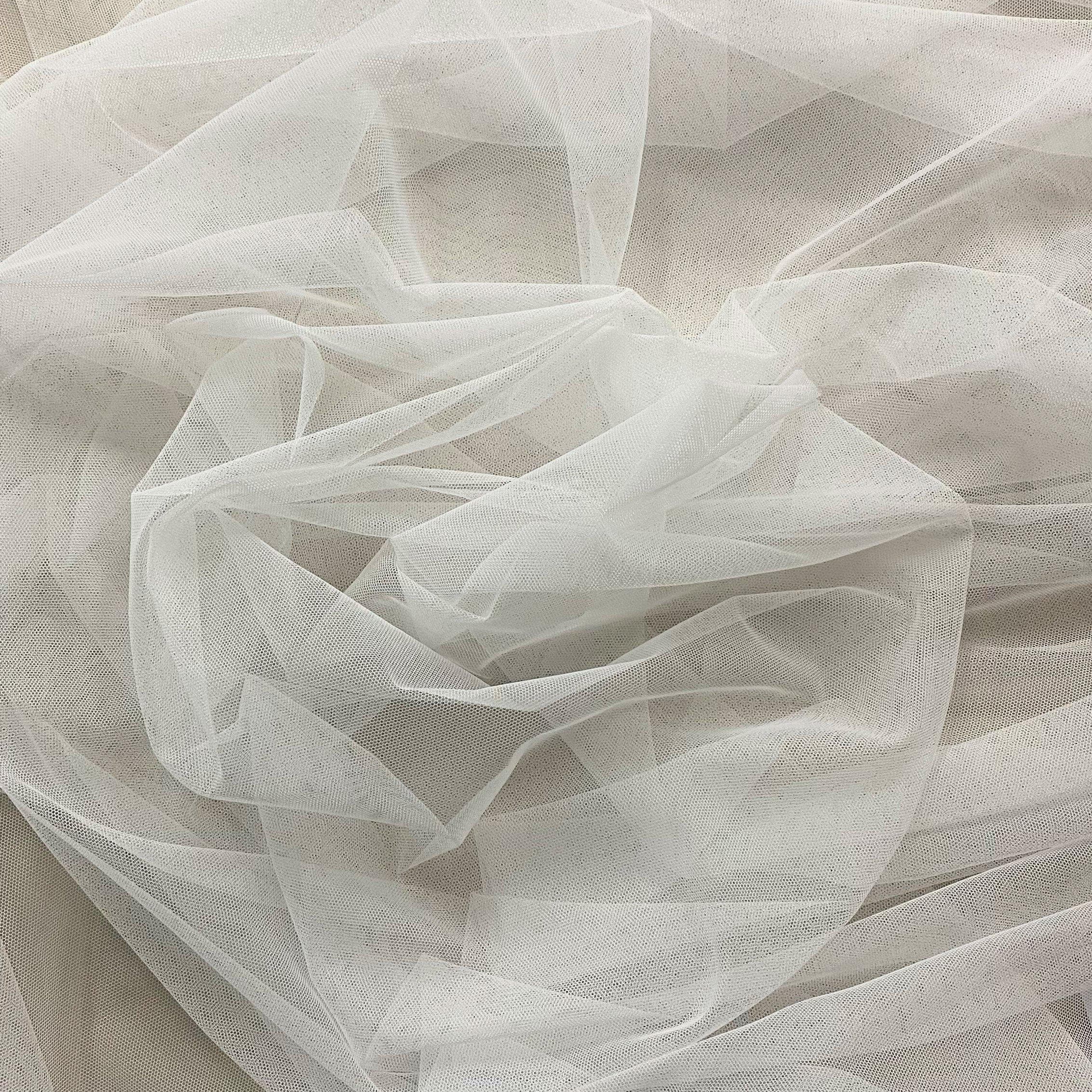 Ivory Polyester Tulle — lightweight and soft, 100% polyester, 150cm wide