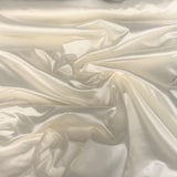 Ivory Queen Satin — a heavyweight silk with a delustred satin finish and structured handle, 100% silk