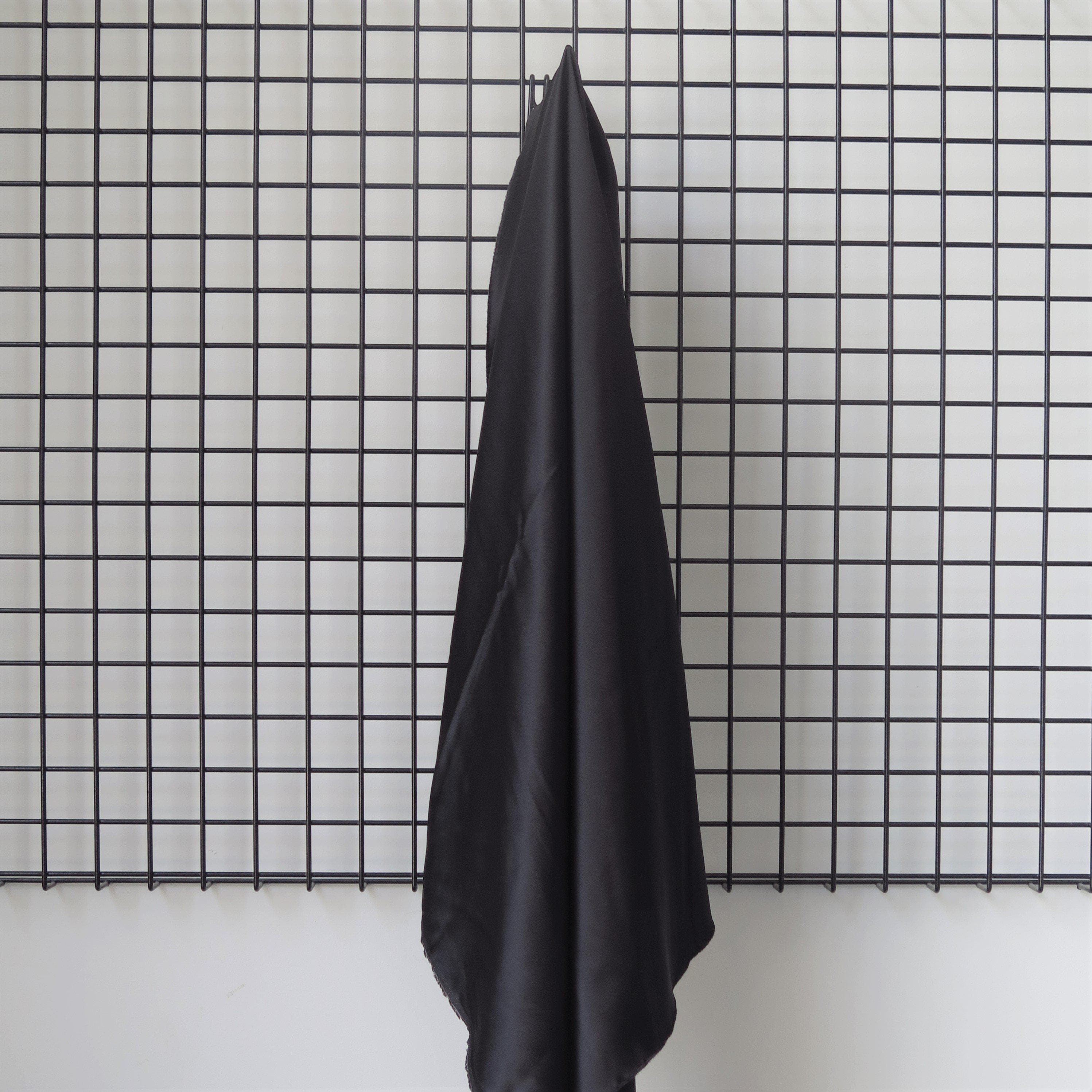 Black Sandwash Satin — lightweight and soft with a smooth luster satin finish, 100% mulberry silk, 140cm wide