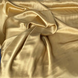 Gold Sandwash Satin — lightweight and soft with a smooth luster satin finish, 100% mulberry silk, 140cm wide