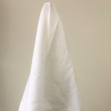Silk White Linen — mid-weight plain-weave linen with a slightly crisp handle that softens with wear, 100% linen, 135cm wide
