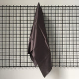 Smoke Sandwash Satin — lightweight and soft with a smooth luster satin finish, 100% mulberry silk, 140cm wide