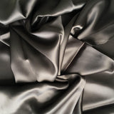 Smoke Sandwash Satin — lightweight and soft with a smooth luster satin finish, 100% mulberry silk, 140cm wide