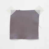 Smoke Sandwash Satin — lightweight and soft with a smooth luster satin finish, 100% mulberry silk, 140cm wide
