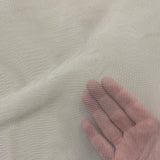 Ivory Soft Tulle — lightweight and soft, 100% polyester, 300cm wide