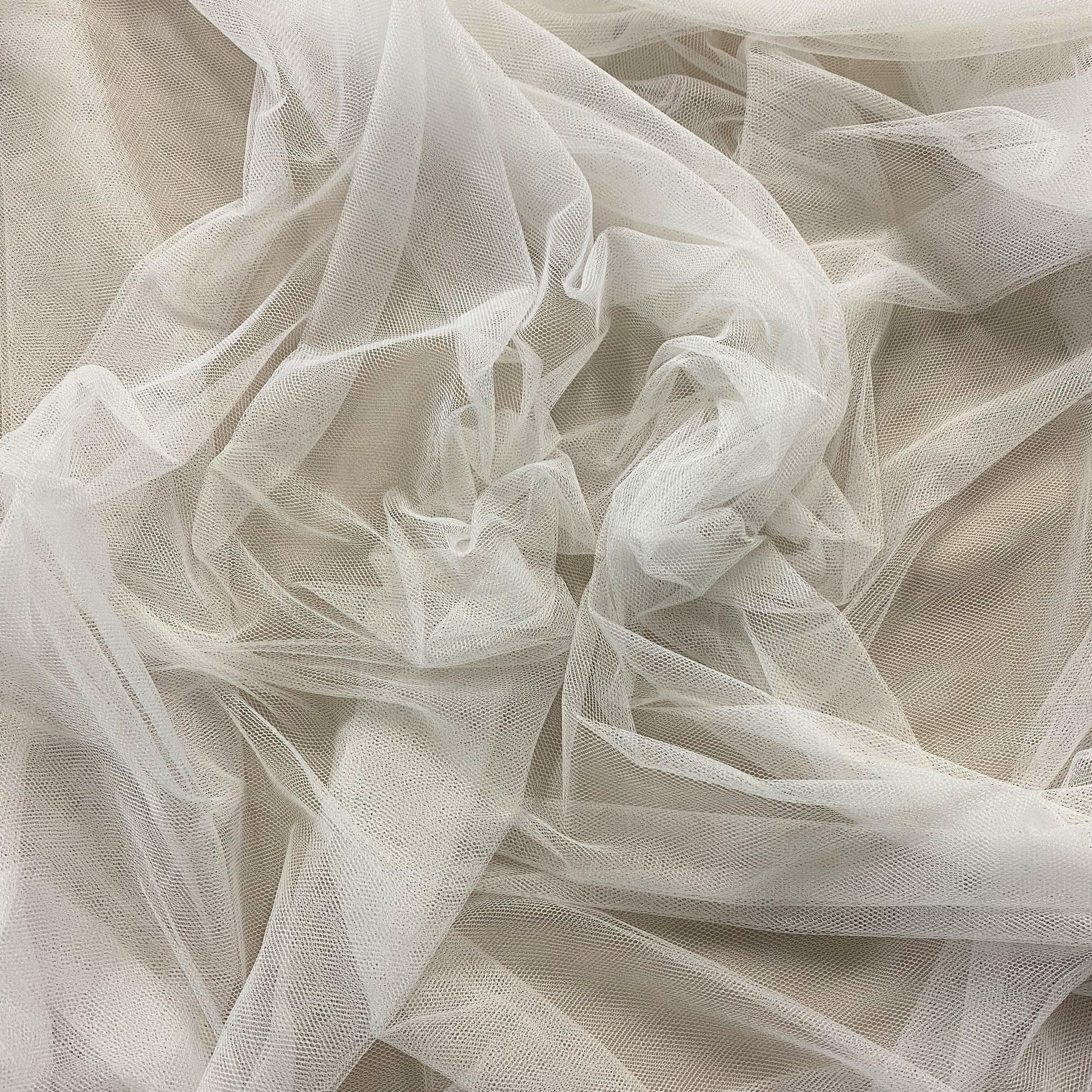 White Soft Tulle — lightweight and soft, 100% polyester, 300cm wide