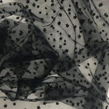 Black Star Tulle — featuring a flocked star design, 100% nylon, 150cm wide