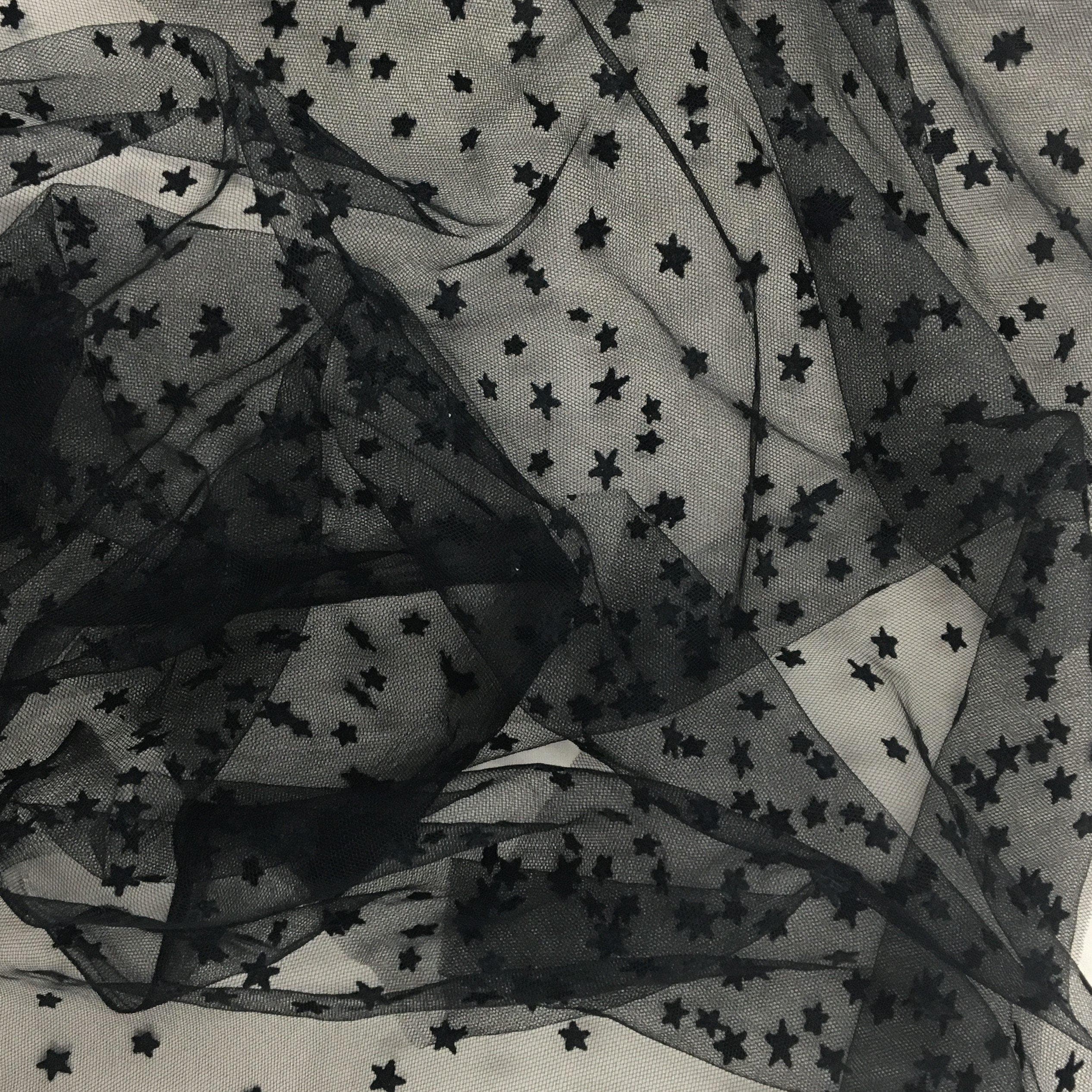 Black Star Tulle — featuring a flocked star design, 100% nylon, 150cm wide