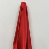 Red Stretch Polyester Lining — lightweight with a satin finish, matte reverse and gentle stretch, in polyester