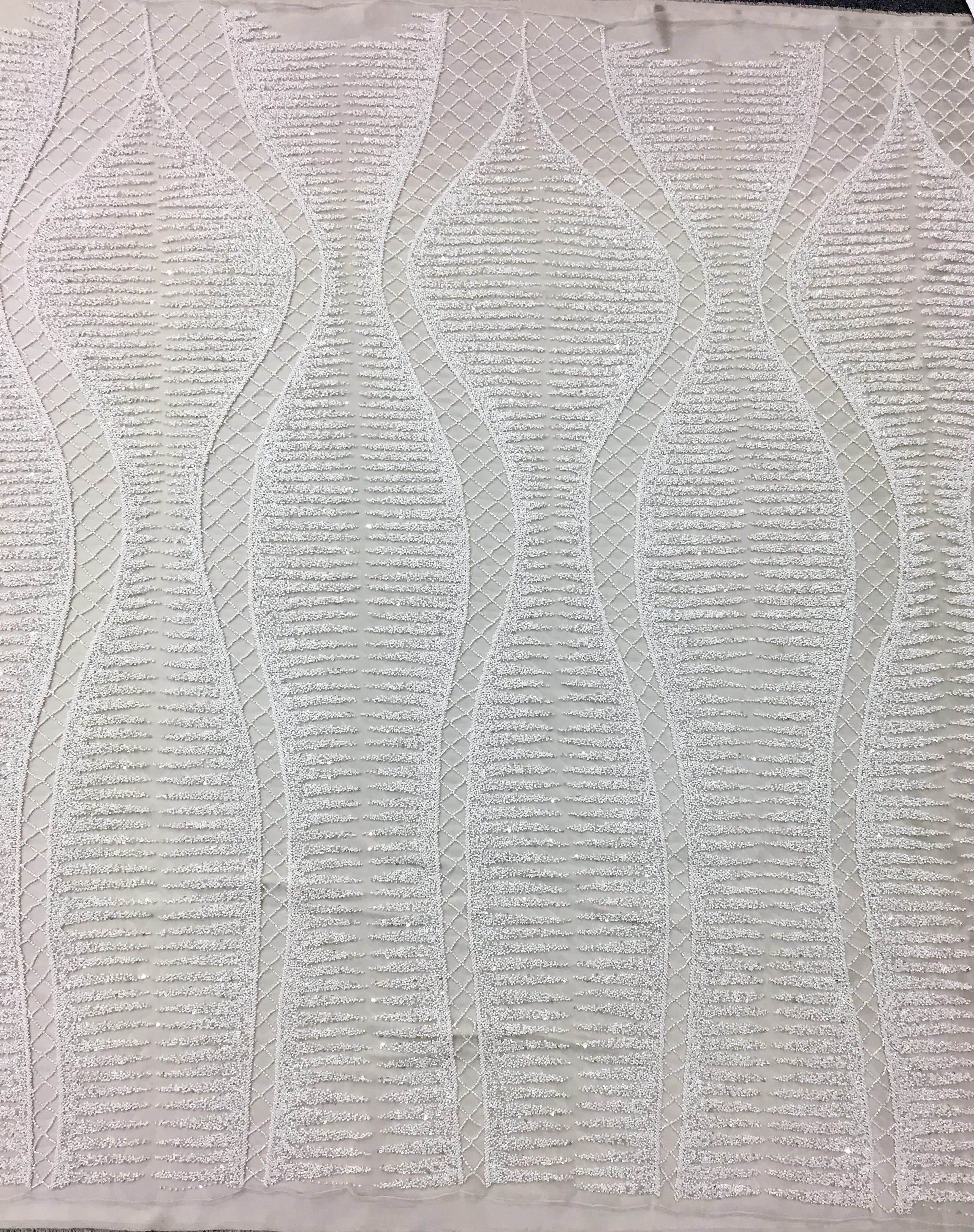 Ivory Ornamental Hand Beaded Tulle — featuring hand-beading and sequins, 100% nylon, 125cm wide