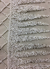 Ivory Ornamental Hand Beaded Tulle — featuring hand-beading and sequins, 100% nylon, 125cm wide