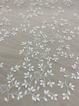 Ivory Leather Floral Embellished Tulle — featuring floral motifs and hand-beading, 100% nylon, 125cm wide
