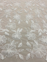 Ivory Embellished Tulle — featuring floral motifs, hand-beading and sequins, 100% nylon, 125cm wide