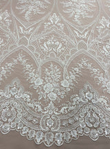 Ivory Embellished Tulle — featuring floral motifs, hand-beading and sequins, 60% rayon 40% nylon, 140cm wide