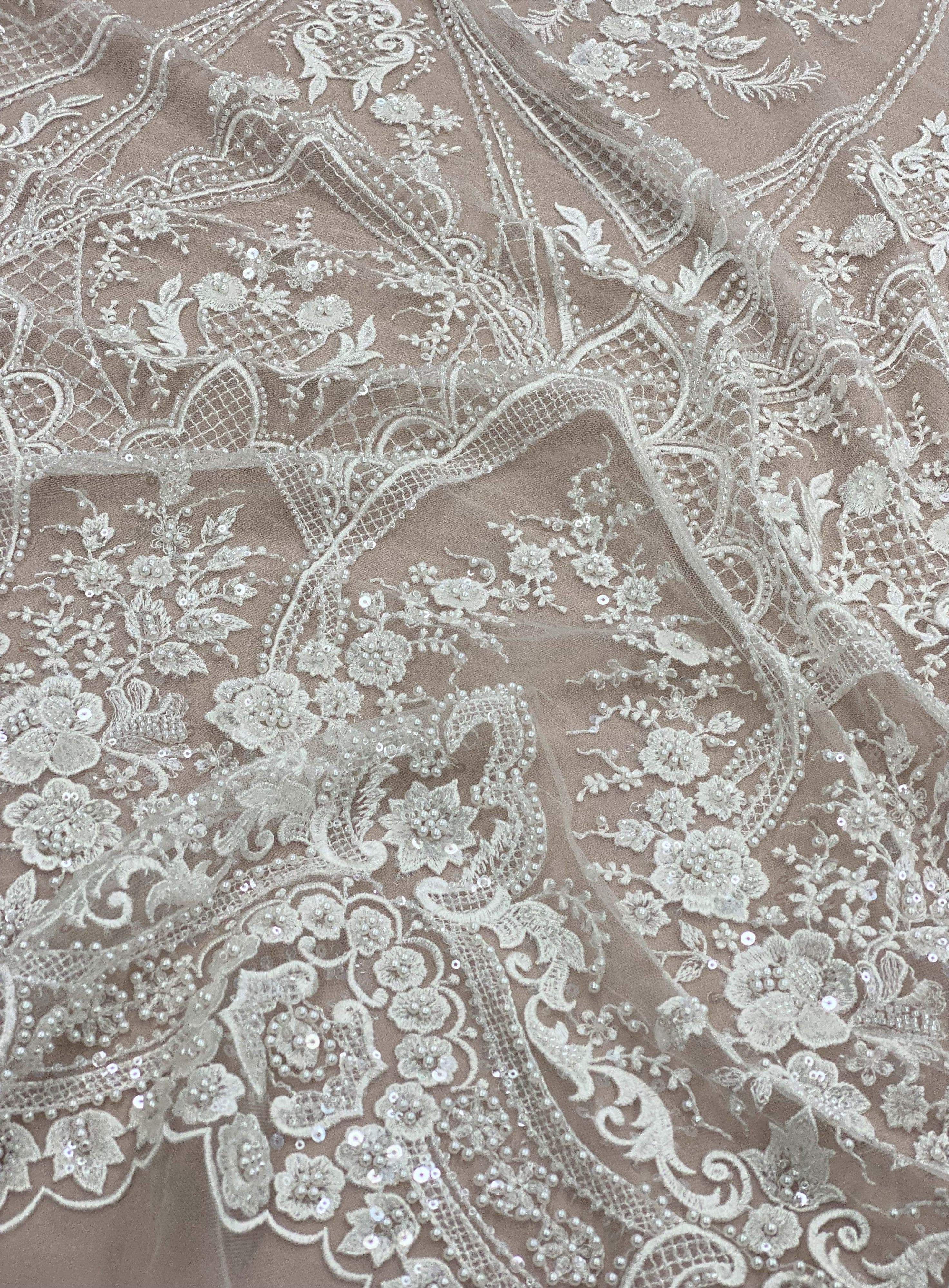 Ivory Embellished Tulle — featuring floral motifs, hand-beading and sequins, 60% rayon 40% nylon, 140cm wide