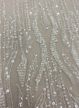 Ivory Embellished Tulle — featuring hand-beading and sequins, 60% nylon 40% polyester, 130cm wide