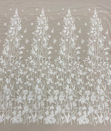 Ivory Embroidered Floral Tulle — featuring floral motifs and sequins, 50% nylon 50% rayon, 130cm wide