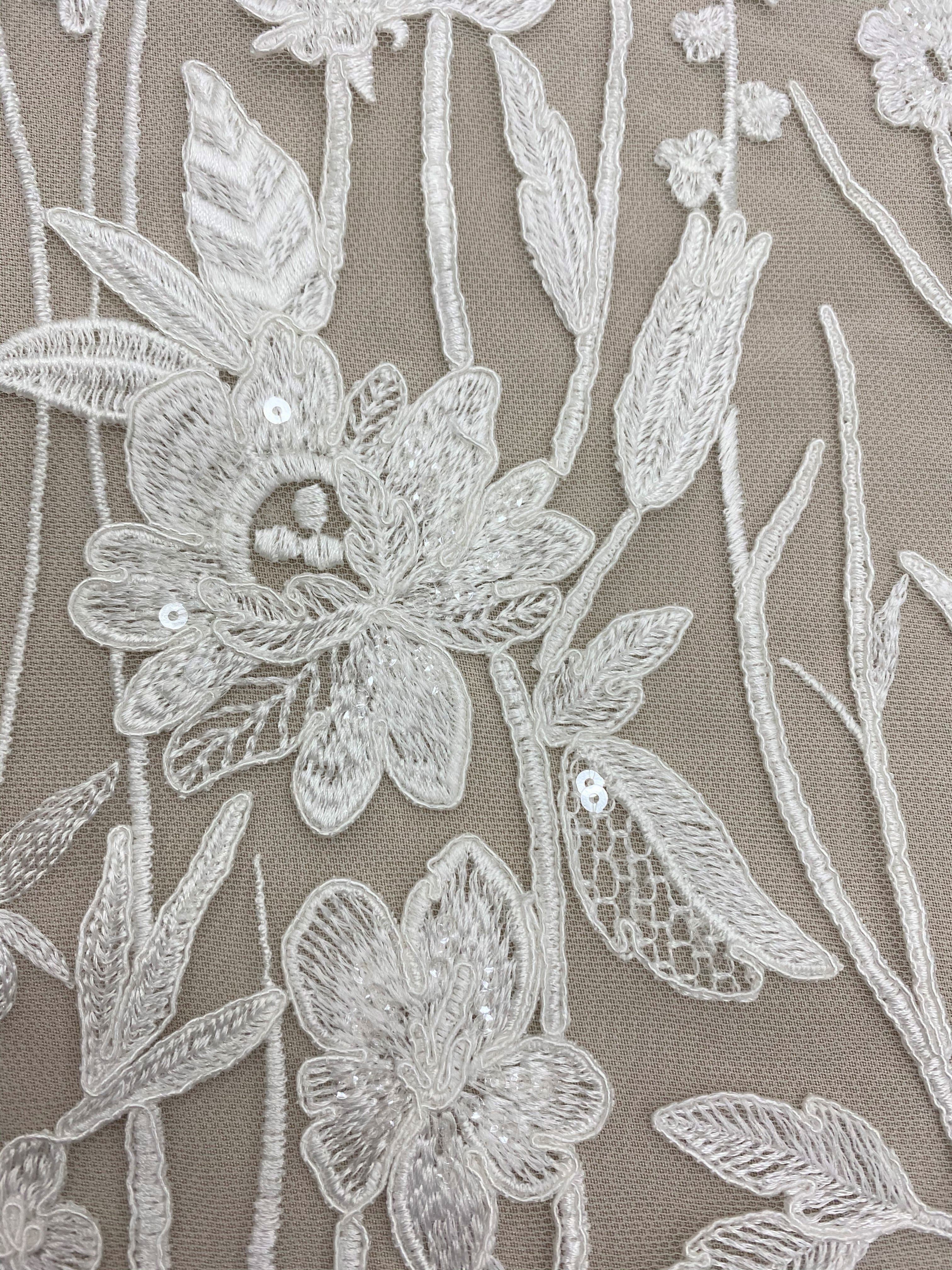 Ivory Embroidered Floral Tulle — featuring floral motifs and sequins, 50% nylon 50% rayon, 130cm wide
