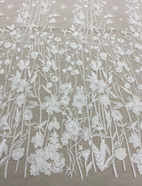 Ivory Embroidered Floral Tulle — featuring floral motifs and sequins, 50% nylon 50% rayon, 130cm wide