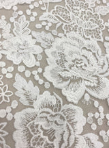 Ivory Embroidered Tulle — featuring floral motifs, 50% nylon 50% rayon, 135cm wide