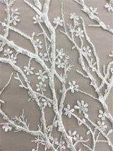 Ivory Floral Embellished Tulle — featuring floral motifs and hand-beading, 50% nylon 50% rayon, 130cm wide