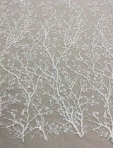 Ivory Floral Embellished Tulle — featuring floral motifs and hand-beading, 50% nylon 50% rayon, 130cm wide