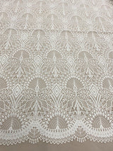Ivory Embroidered Ornamental Tulle — featuring art deco motifs, 60% nylon 40% polyester, 130cm wide