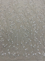 Ivory Floral Embellished Tulle — featuring floral motifs, hand-beading and sequins, 60% nylon 40% metallic, 130cm wide