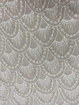 Ivory Embellished Tulle — featuring hand-beading and sequins, 60% nylon 40% polyester, 130cm wide