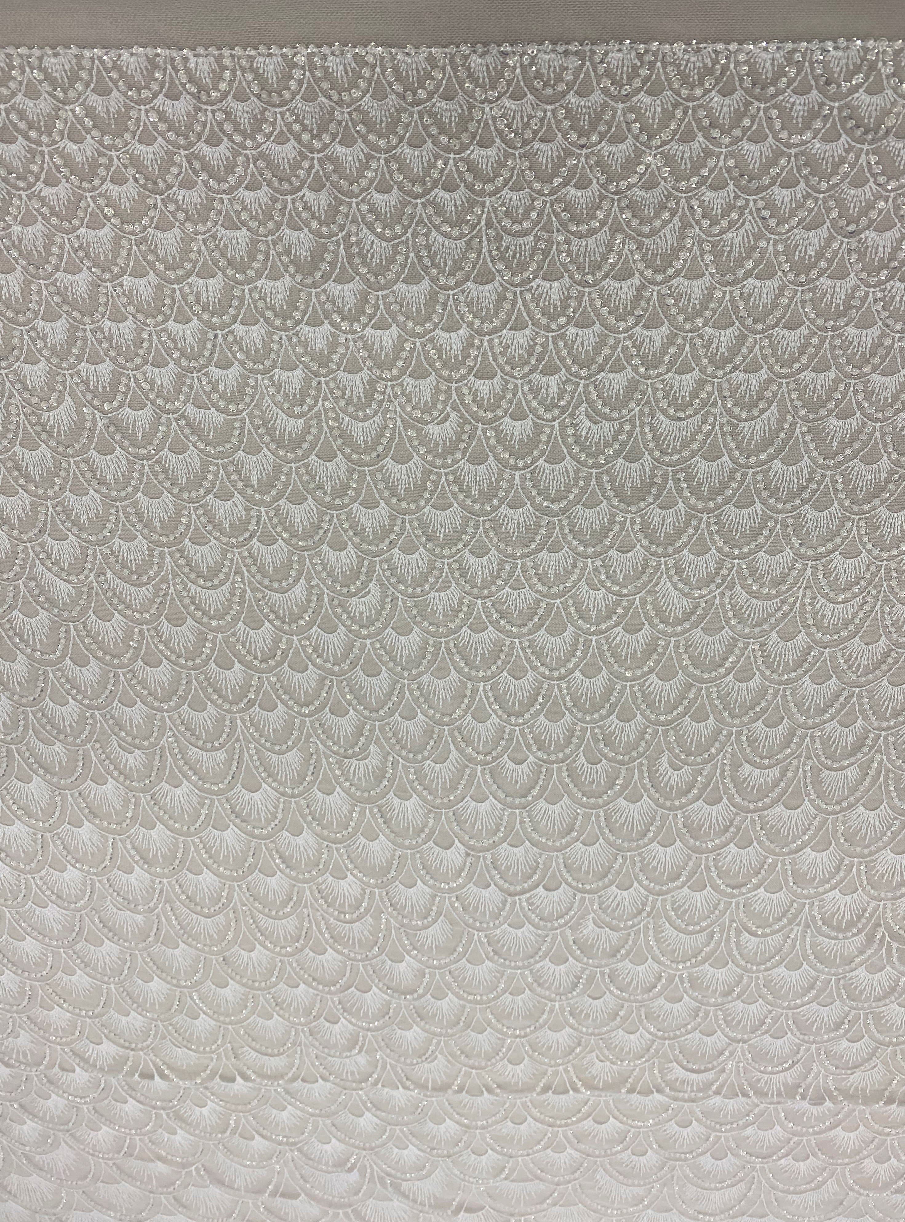 Ivory Embellished Tulle — featuring hand-beading and sequins, 60% nylon 40% polyester, 130cm wide